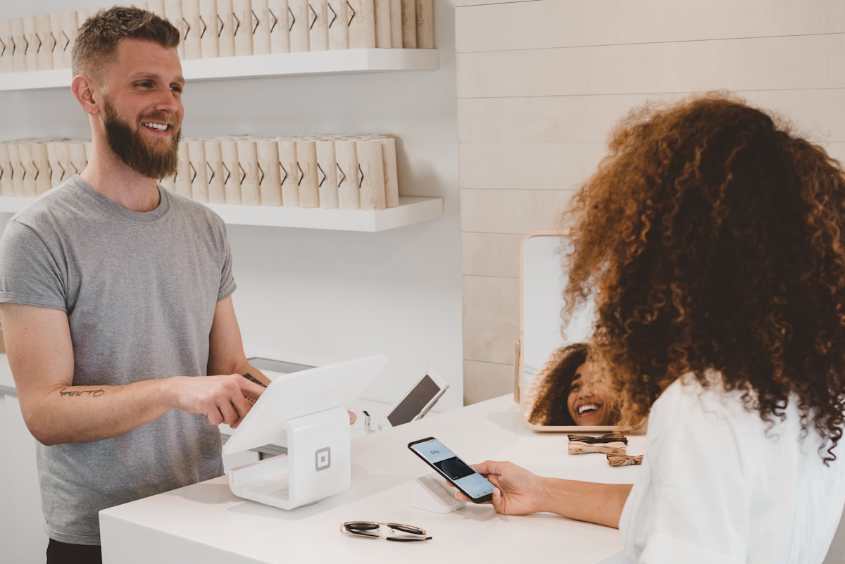 Luxury e-commerce storefront displayed on laptop and phone